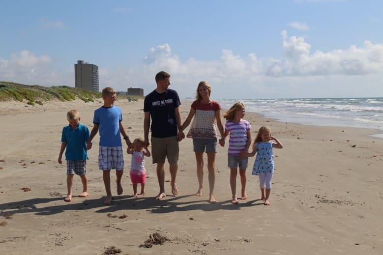 Family walking the beach